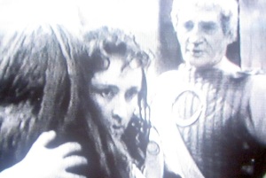 Andromache embraces Hecuba on hearing from Talthybius that her son is to be killed